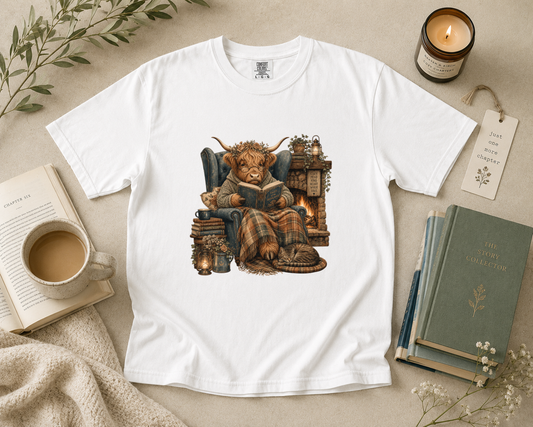 Highland Cow Reading by the Fireplace T-Shirt