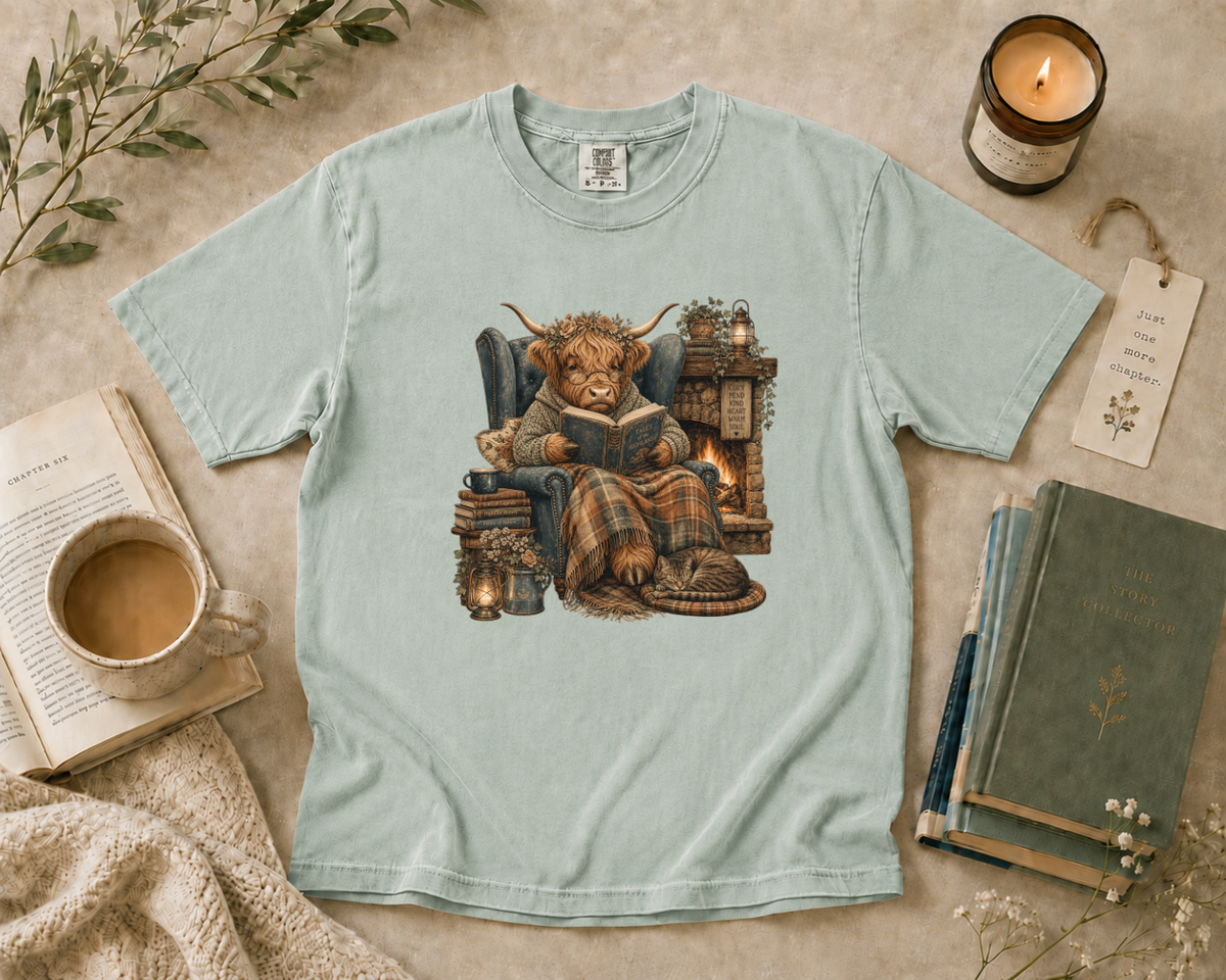 Highland Cow Reading by the Fireplace T-Shirt