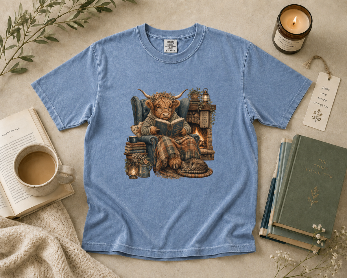 Highland Cow Reading by the Fireplace T-Shirt